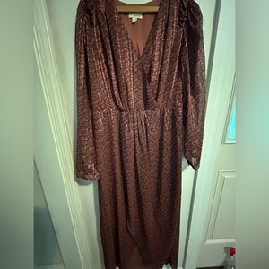The Korner brown, maxi dress with sleeves. Sheer skirt. Floaty, earthy, relaxed